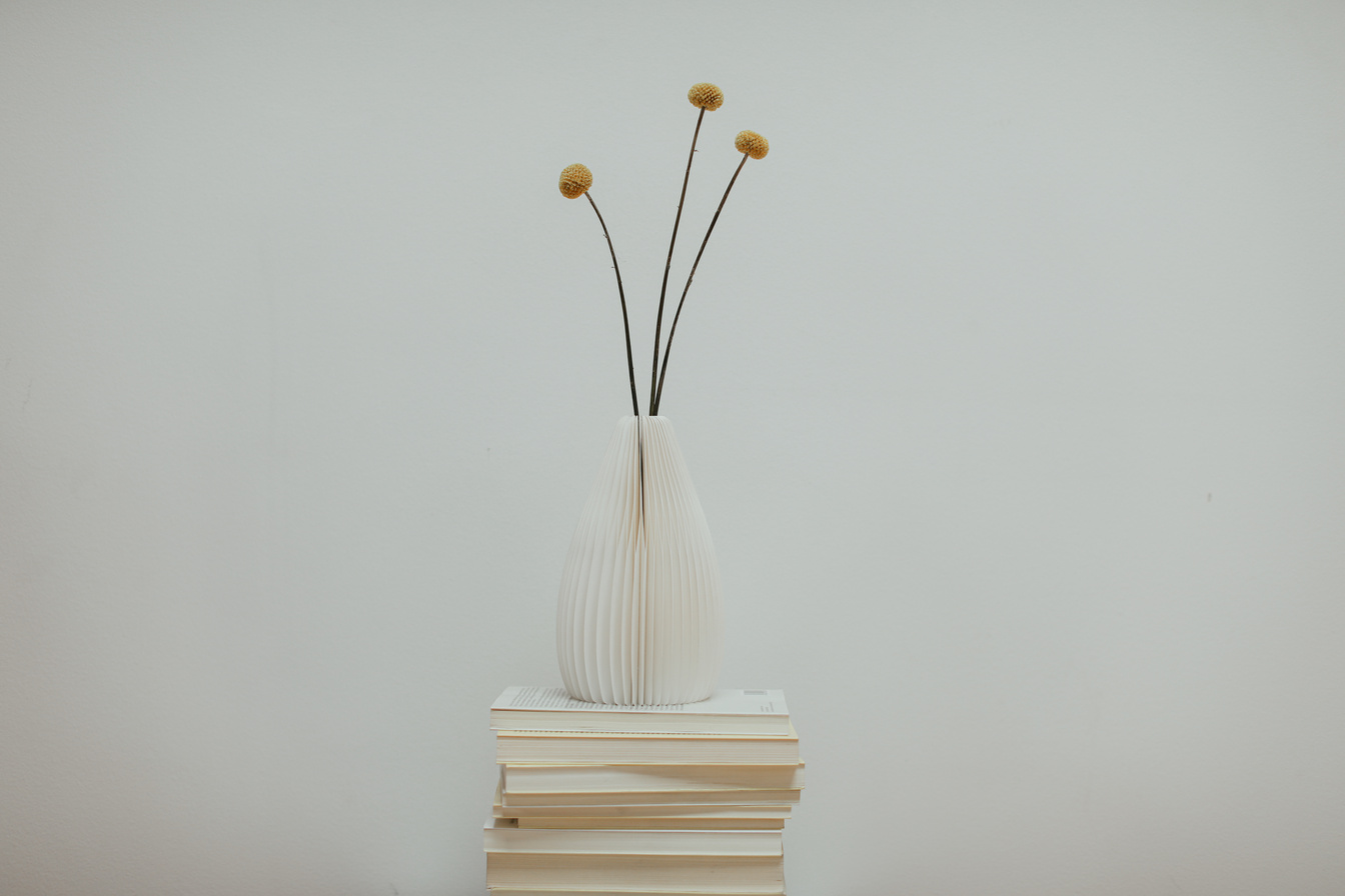 Yellow Dandelion Flowers on White Ceramic Vase