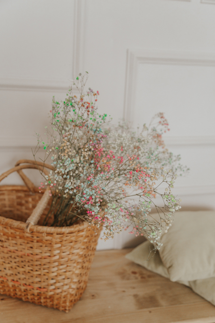 Gypsophila flowers in wicker basket